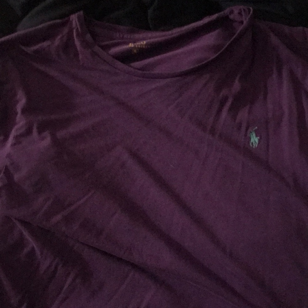 A purple and light blue polo tee shirt